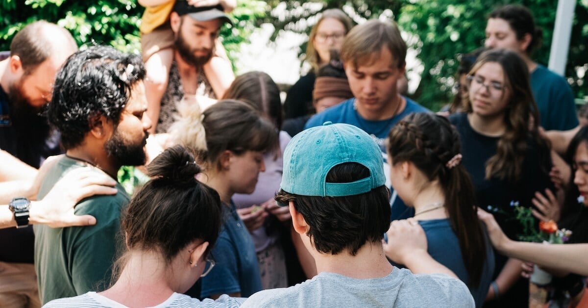 DTS students praying for each other